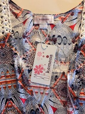NWT Bohemian-style open-front sleeveless fringe vest, cover